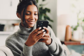 phone-smile-woman-sofa-home-with-texting-social-media-networking-mobile-app-happy-technology-female-person-with-cellphone-chatting-contact-communication-living-room_590464-559804